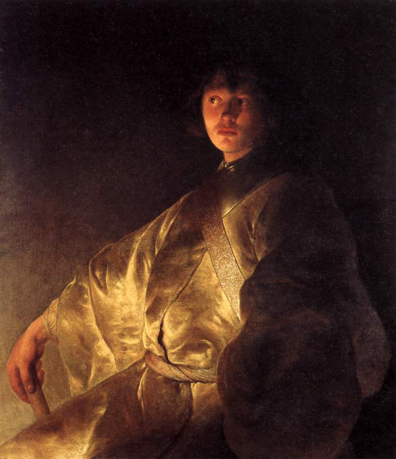 young man in a yellow robe
